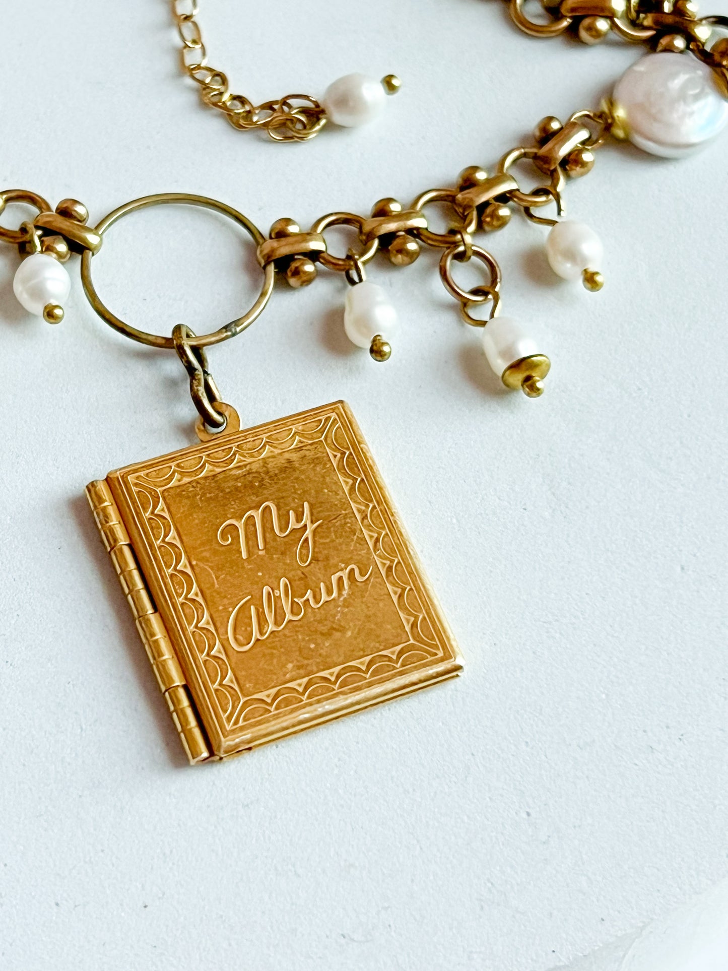 Vintage Deadstock Brass Chain Necklace With 70's "My Album" Photo Locket, Brass Capped White Coin, and Rice Pearl Fringe